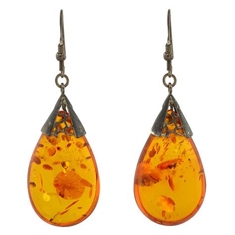 amber cutout drop earrings.